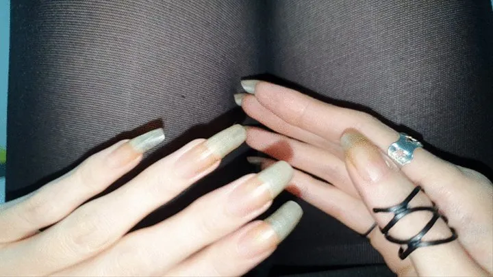 Long legs, long natural nails and black tights