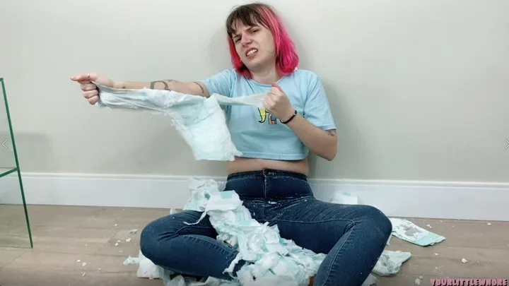 destroying diapers and spitting on them