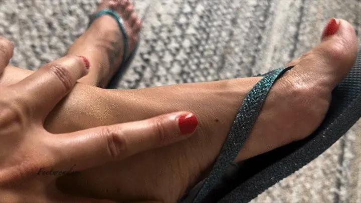 Flip flops and veiny feet