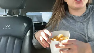 Stuffing Jane's Face in the Car