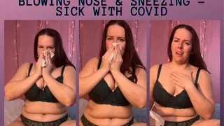 Blowing nose & sneezing -sick with covid