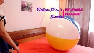 Beach ball on bed