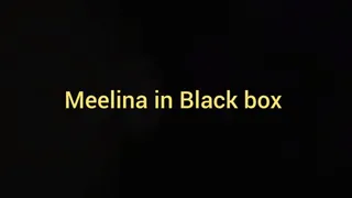 Meelina handcuffed in Black box