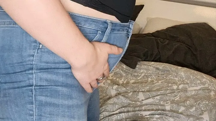 Lesbian huge belly in jeans and tight clothing finally burps