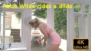 Aston Wilde rides a dildo