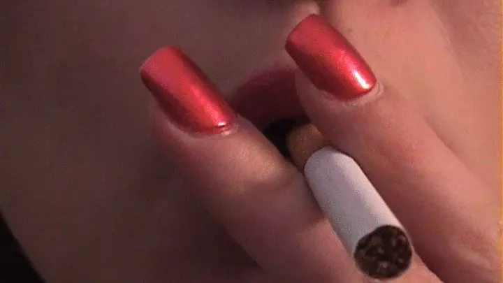 EXTREME CLOSEUP OF SABRINAS LIPS SMOKING