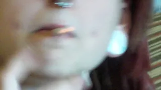 CLOSEUP OF GOTH WHORE MOLLY INHALE AND EXHALE