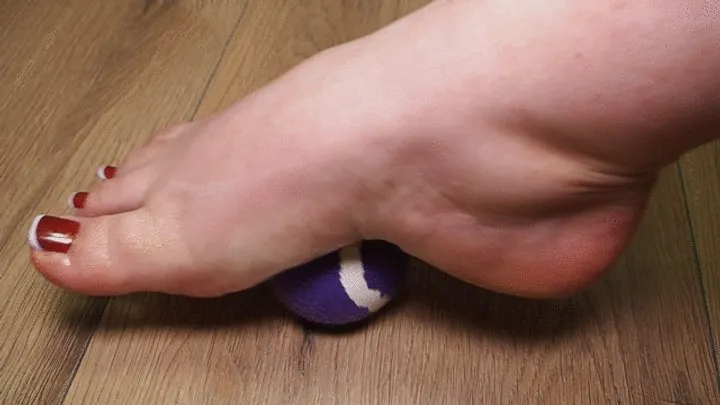 Tennis Ball Under Control: Close Up Of BBW's Right Foot