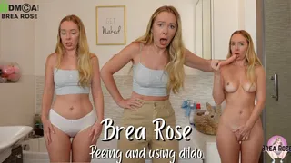 Peeing and using dildo