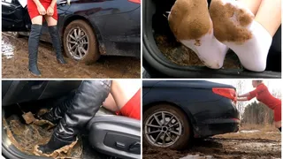 Car stuck in deep mud BMW and sexy girl in muddy high boots