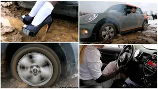 Car stuck in deep soft mud wearing retro outfit driving Mini Cooper