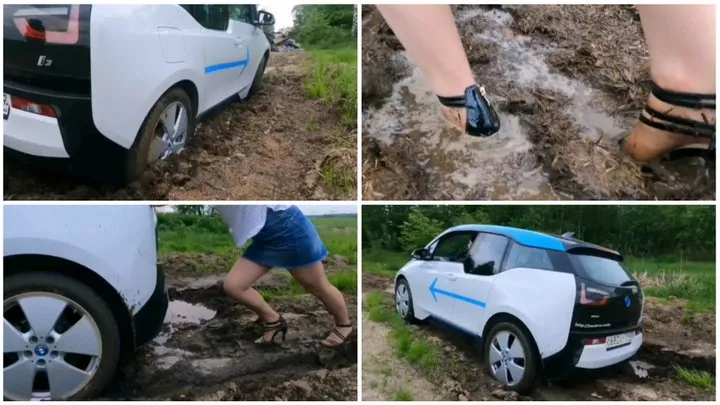 Exclusive BMW I3 car stuck in deep soft mud muddy and wet high heels and pantyhose feet