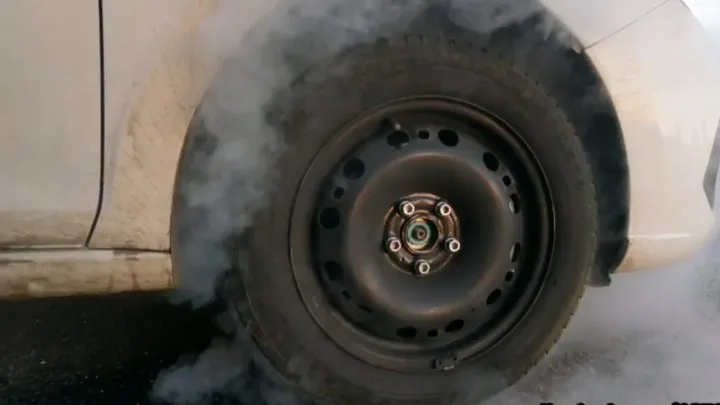 Crazy burnouts on dry asphalt crushed tires