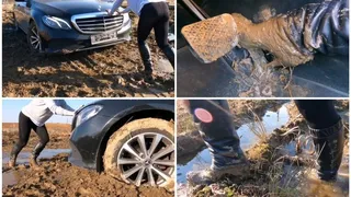 Real estate car stuck in deep mud in luxury Mercedes E class