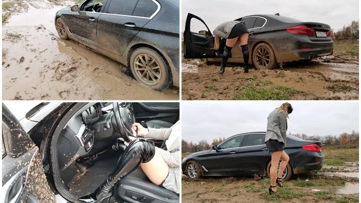Russian girl gets stuck in deep mud in luxury BMW 5-series