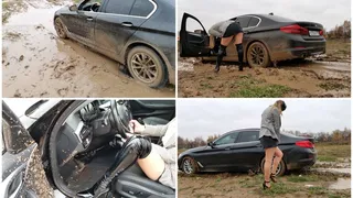 Russian girl gets stuck in deep mud in luxury BMW 5-series