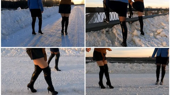 Sexy girls in high heel boots on the slippery road