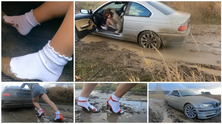 Real estate agent for her powerful BMW stuck in deep mud