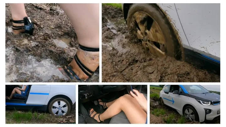 Real estate has her luxury electric rwd BMW stucked in deep soft mud