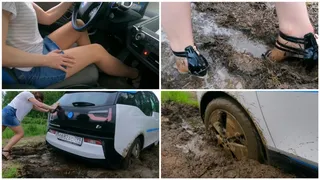 Exclusive rwd electrocar stuck in deep puddles and mud BMW i3