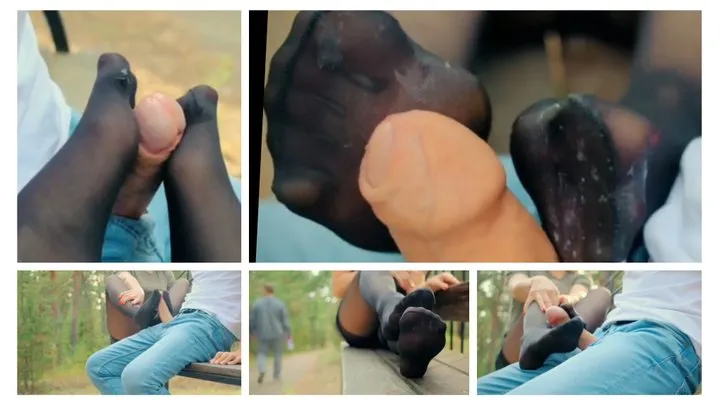 Emily makes nylon footjob in a public place