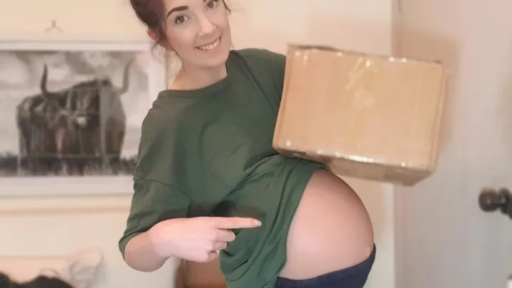 "I've got a package!" Asma opens her prosthetic baby belly parcel