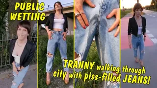 Public Wetting! Tranny Girl is walking through the city with piss-filled jeans!