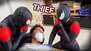 Thief Mummified By Tape Gag Loving Spider-Girls!