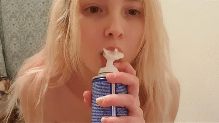 Cute girl gets crazy with whipped cream