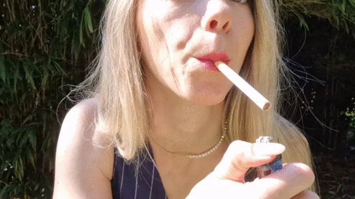 Smoking outdoors with lipstick