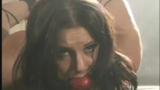 Bind pretty cute brunette in red stockings gets her holes screwed in the warehouse by two men