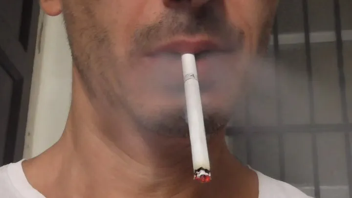 Smoking Muratti red 100s closeup IYF 051024 SLOW