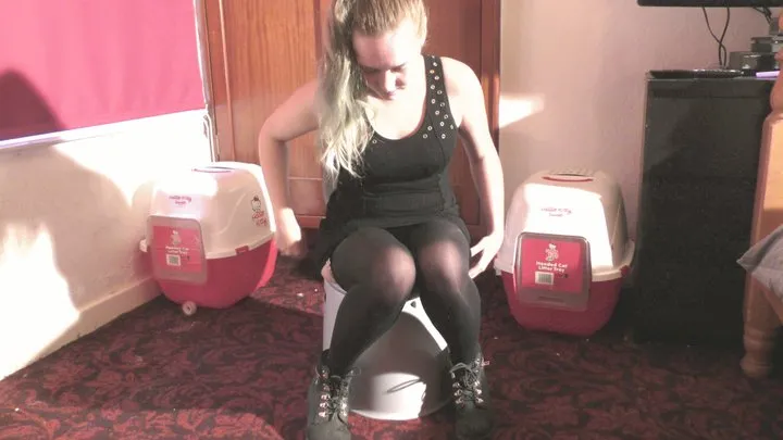 Hot Girl In Black Dress Tights & Boots Peeing In A Jug On The Portable Toilet