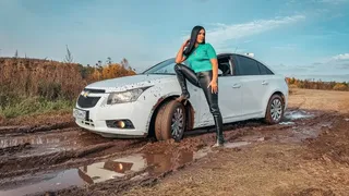 CAR STUCK Christina got stuck in a muddy puddle with her boots