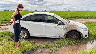 CAR STUCK Ellie got stuck in the mud when she tried to turn around