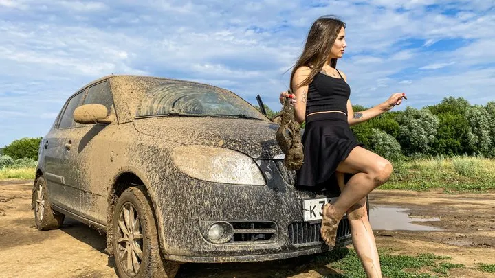 CAR STUCK Tanya stuck in the mud in high heeled sandals and barefoot