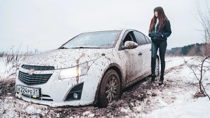 64 Russian Girl Stuck Maria stuck in muddy snow in high heels ankle boots