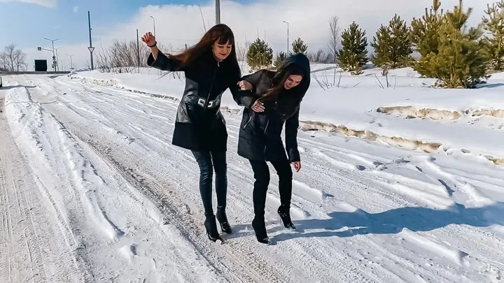 78 Tanya and Maria walk in slippery shoes in the snow