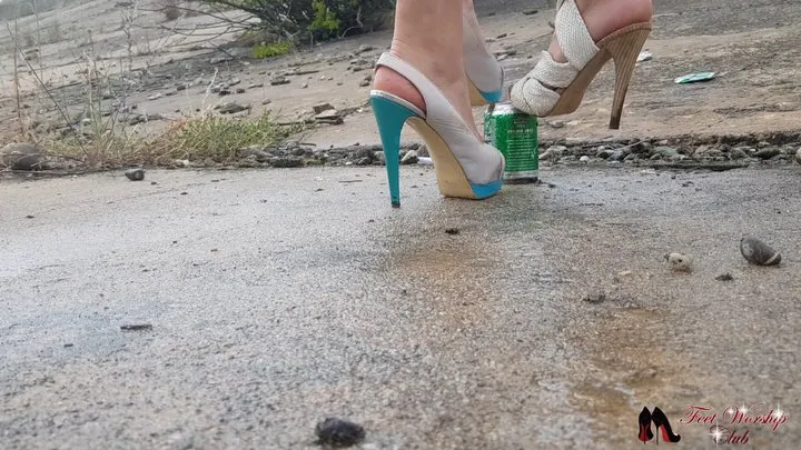 Two girls in high heels crushing cans