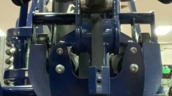 Spy cam at gym during leg press