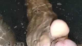 improvised footjob in jacuzzi