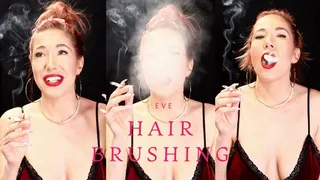 Hair brushing and hair play while smoking