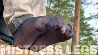 Feet Teasing At The Forest In Torned And Sweaty Black Nylon Socks