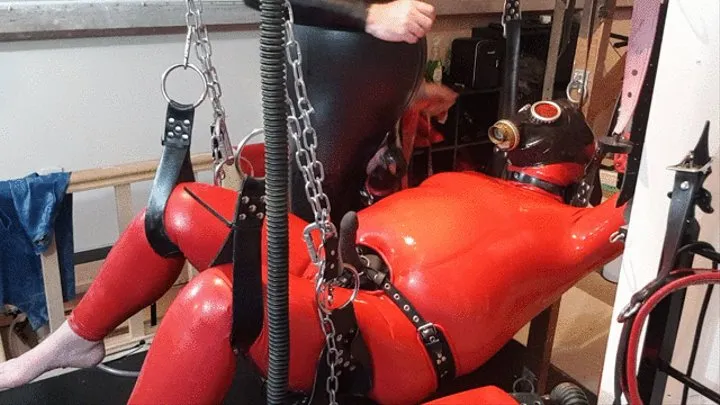 Rubber Sling Bondage New Years Eve