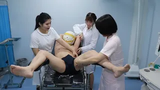 Patient being tickled and treated by Japanese nurse and female doctor