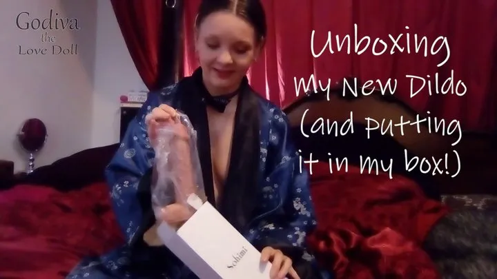 Unboxing my new dildo, and putting it in my box!