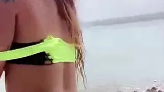 Sexy chick Katty Roldan strips naked on the beach