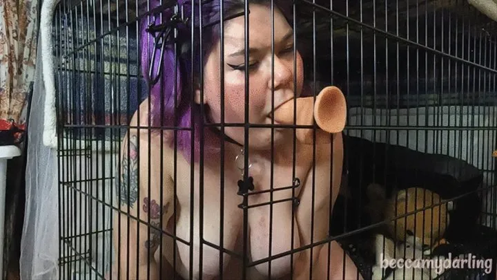 BBW puppy practicing deepthroating in cage!