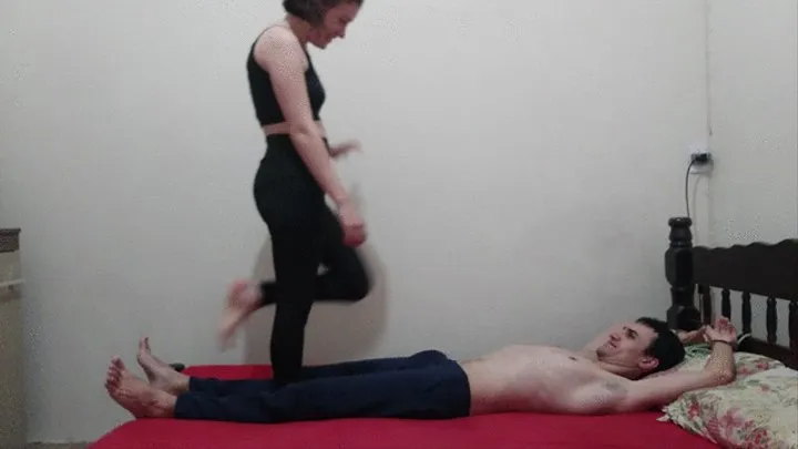 04# Beatriz trampling tied slave on bed cam 1