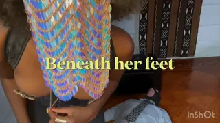 Beneath her feet
